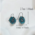 Zarte handwerkliche Ohrring